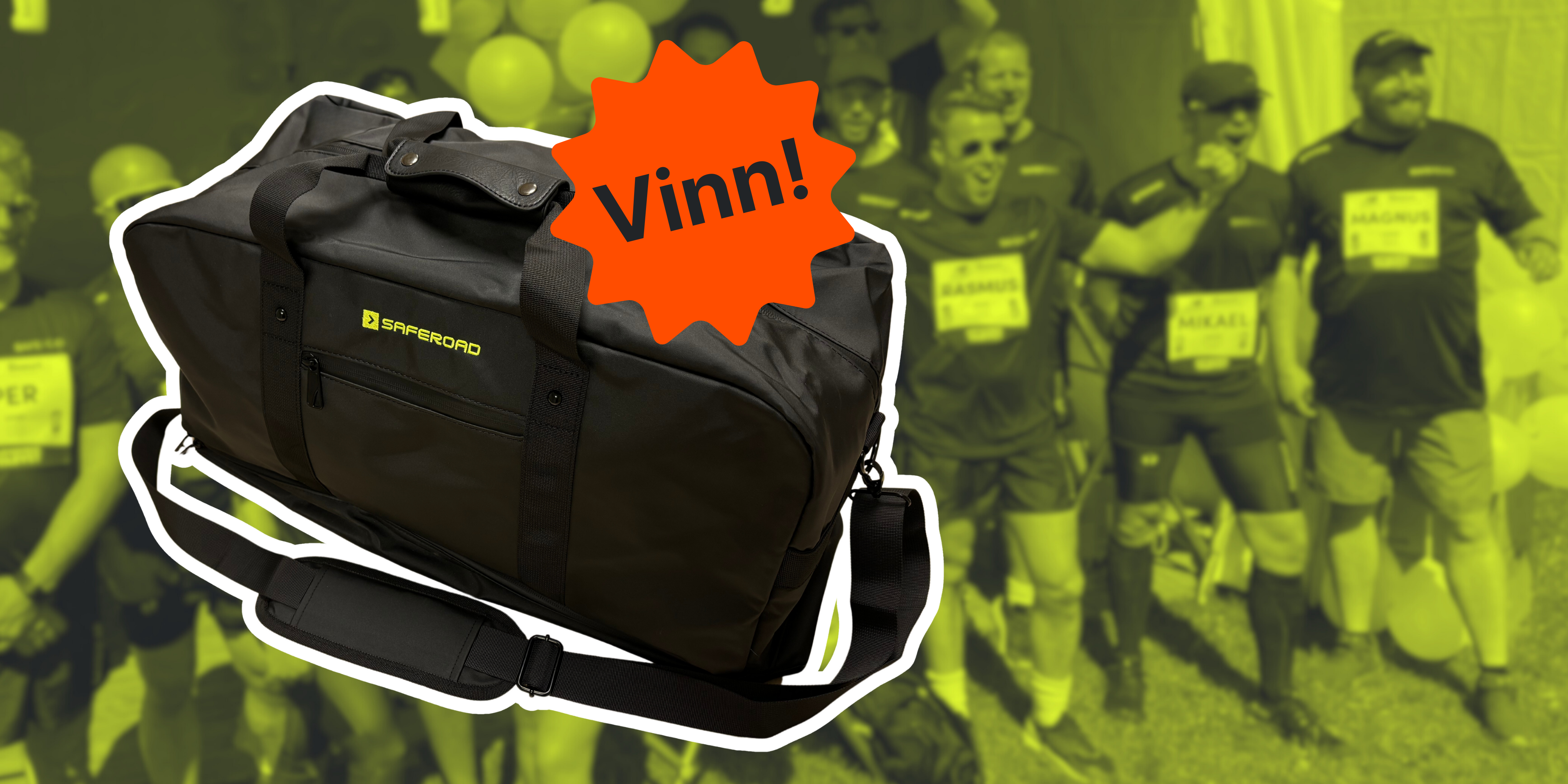 Svart weekendväska med gul Saferoad-logga med en orange stjärna med texten Vinn!