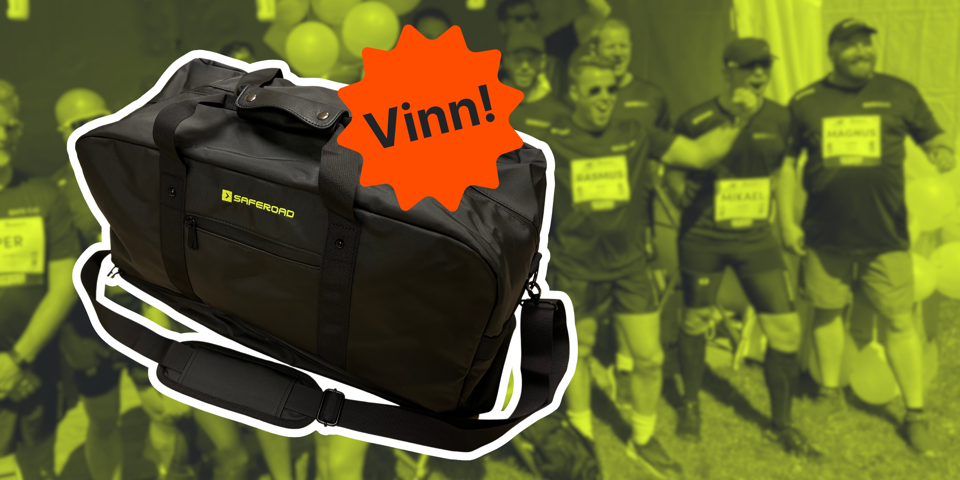 Svart weekendväska med gul Saferoad-logga med en orange stjärna med texten Vinn!